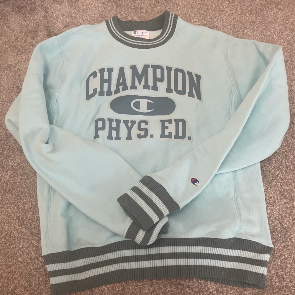 A light blue champion crew neck